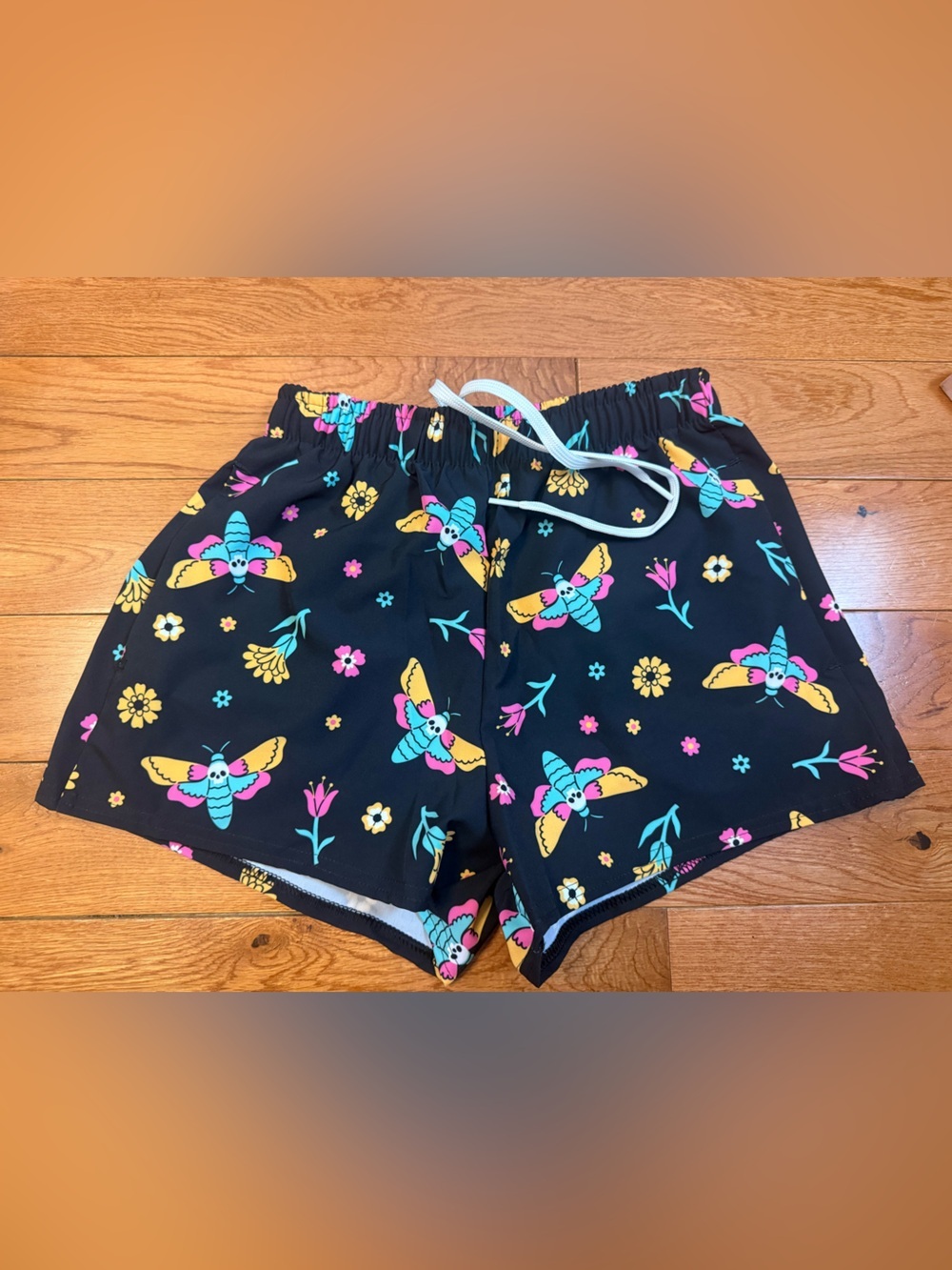 Goth Cloth ‘Moth Magic’ Unisex Unlined 2.5” inseam Swim Trunks NWOT